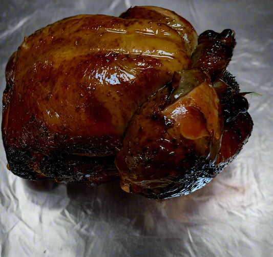 Roasted chicken on a piece of tinfoil